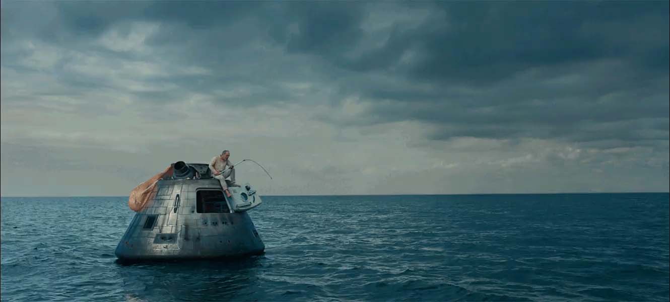 Space capsule floating in water