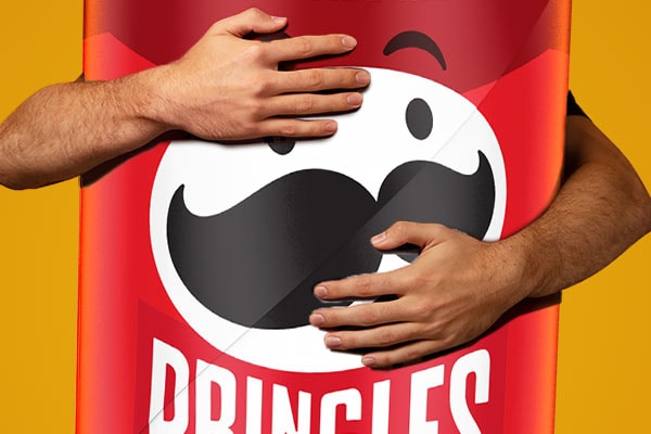 Arms hugging a Pringles can